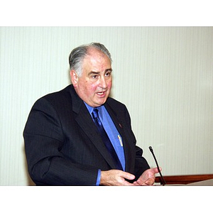 Harry P. Keegan III, CBA '64, at podium after receiving the College of Business Administration Distinguished Service Award