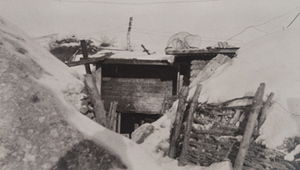 A German dugout under barbed wire and snow