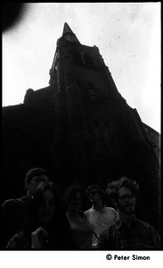 Communards standing in front of ivied chapel: Verandah Porche, Harvey Wasserman, Lissa Matross, Kim Rosen, and Michael Gies (clockwise from left)