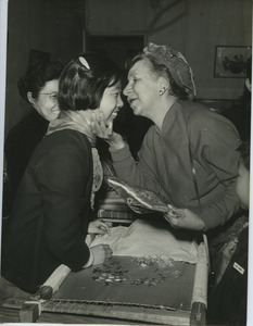 Shirley Graham Du Bois kissing an unidentified girl