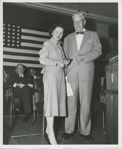 Bruce Barton presenting prize to Ann Huyland at Institute Day