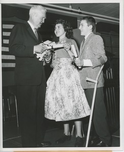 Mr. Bruce Barton with young clients at graduation exercises