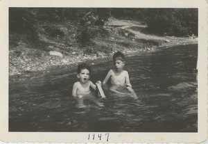 Paul and Joel Kahn in an unidentified body of water