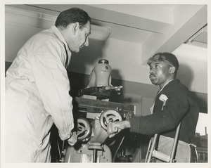 Two men in machine shop