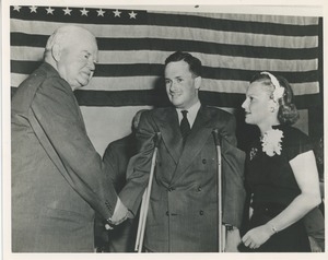 President Hoover shaking hands with a client