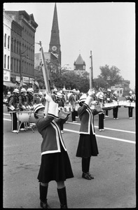 Women performing with drill team and drum line, corner of Main Street and Crafts Ave.