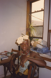 Photographs of Marsha P. Johnson Wearing a White Floral Headpiece and Blue and Gold Sequined Top, Sitting in Randy Wicker's Apartment