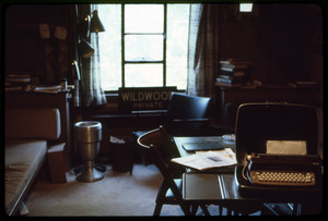 Portable typewriter and stand in an home office