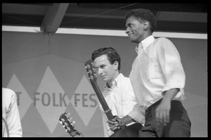 Mitch Greenhill (left) and Jackie Washington leaving the stage after their set, Newport Folk Festival