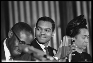 Walter E. Fauntroy (center) seated with Jean Fairfax (right) and unidentified man on a panel at the Youth, Non-Violence, and Social Change conference, Howard University