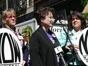 Unidentified women from the National Organization for Women addressing the crowd during the march opposing the War in Iraq