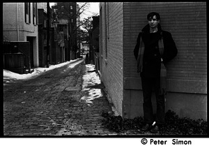 Stephen Davis (BU News) standing by an alley