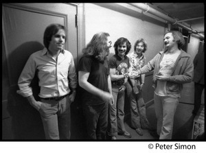 Grateful Dead backstage (left to right): Bob Weir, Jerry Garcia, Mickey Hart, Phil Lesh, and Bill Kreutzman