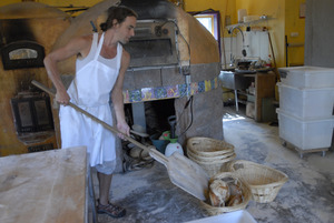 Hungry Ghost Bread: owner and baker Jonathan C. Stevens with fresh-baked bread