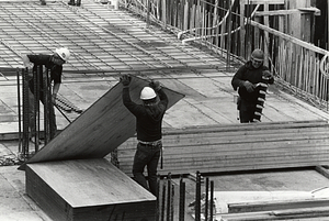 Three unidentified construction workers