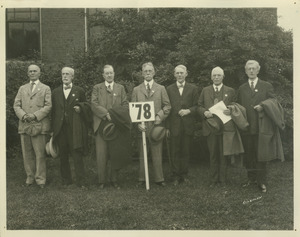 Members of class of 1878; Brigham, Baker, Loomis, Foot, Howe, Stockbridge and Tuckerman standing outdoors at Alumni Day