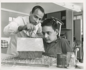 Luis Damilano assembling birdhouse