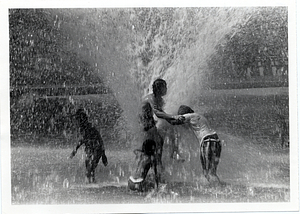 Children playing in a fountain in Boston Common