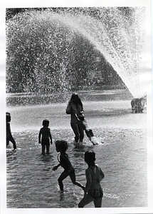 Children playing in a fountain in Boston Common