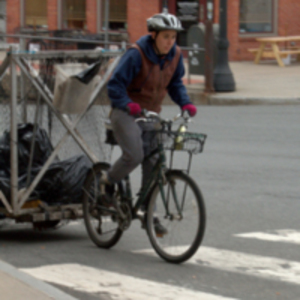 Pedal People Person picking up trash