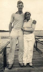 Brother and sister, Guy and Eunice Garland, on dock in West Falmouth Harbor