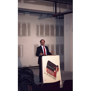 Speaker at Taino Tower ribbon cutting ceremony.