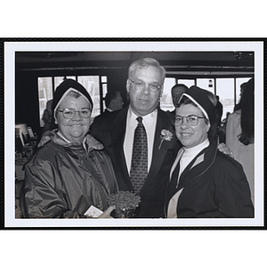 Thomas M. Menino, Mayor of Boston, posing with two nuns at a St. Patrick's Day Luncheon