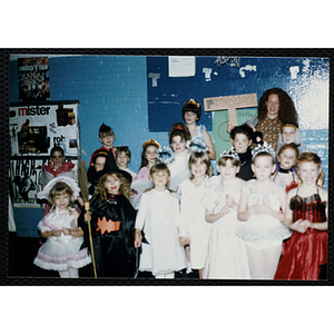 Winners of the "Prettiest" Halloween costume contest pose for a group shot