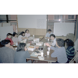 Guests talking during a Chinese Progressive Association anniversary event