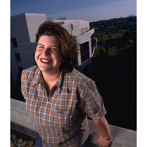 Co-op student standing on the roof of Northeastern's Snell Library