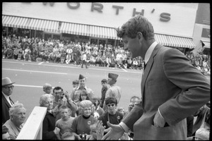 Robert F. Kennedy greeting the crowd across the street from the Woolworth store in Worthington during the Turkey Day festivities