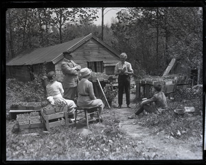 Walter H. Heath, self-proclaimed "Poet of Monadnock," reading to a group outdoors