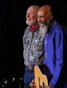 Pete Seeger and Richie Havens (guitar) at the end of a set at the Clearwater Festival