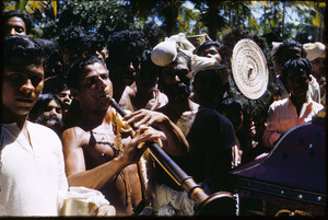 Man playing a nāāgasvaram