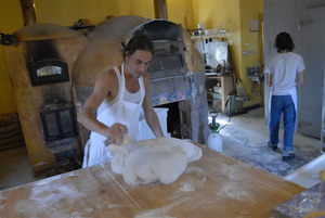 Hungry Ghost Bread: owner and baker Jonathan C. Stevens working on cinnamon rolls