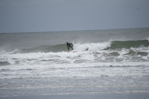 Surfer riding a wave