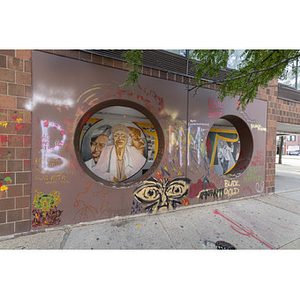 Harriet Tubman House The Honor Roll Mural on Columbus Avenue through facade from left