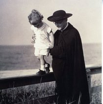 The Reverand F. C. Powell and child