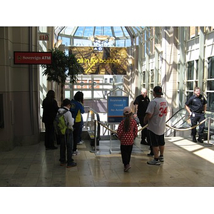 Public stand by blocked exit inside the Prudential Center