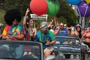 Paraders riding in cars : Provincetown Carnival parade