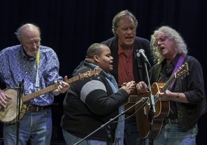 Pete Seeger (banjo), Toshi Reagon, Tom Chapin, and Arlo Guthrie performing at Symphony Space, New York City, in a concert to pay tribute to George Wein