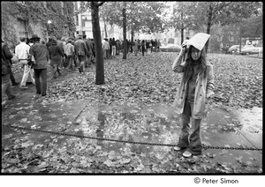 MIT war research demonstration: Lacey Mason, posing by marching demonstrators