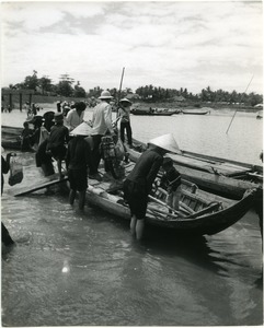 People boarding a boat