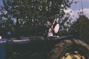 Man smoking on his tractor