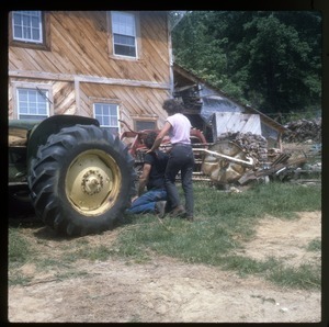 Dan and Nina Keller with tractor, Wendell Farm