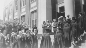 Graduates filing into Stockbridge Hall