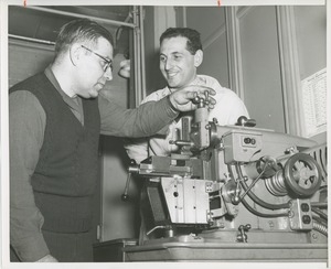 Two men in machine shop