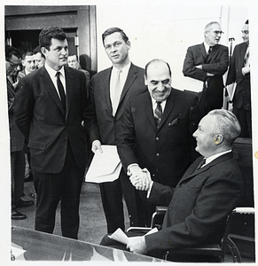 Massachusetts Senator Edward Kennedy, Governor Endicott Peabody, unidentified man, and Mayor John F. Collins