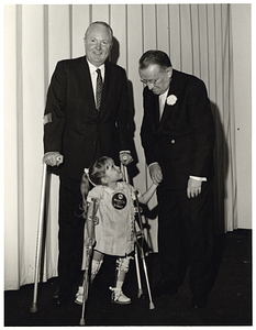 Mayor John F. Collins with unidentified man and child promoting March of Dimes