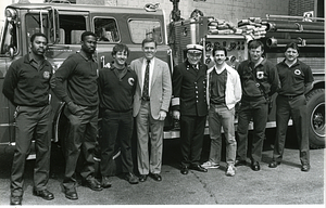Mayor Raymond L. Flynn and Boston Deputy Fire Commissioner Leo D. Stapleton marking the delivery of the new Engine 24 with a group of Boston firefighters